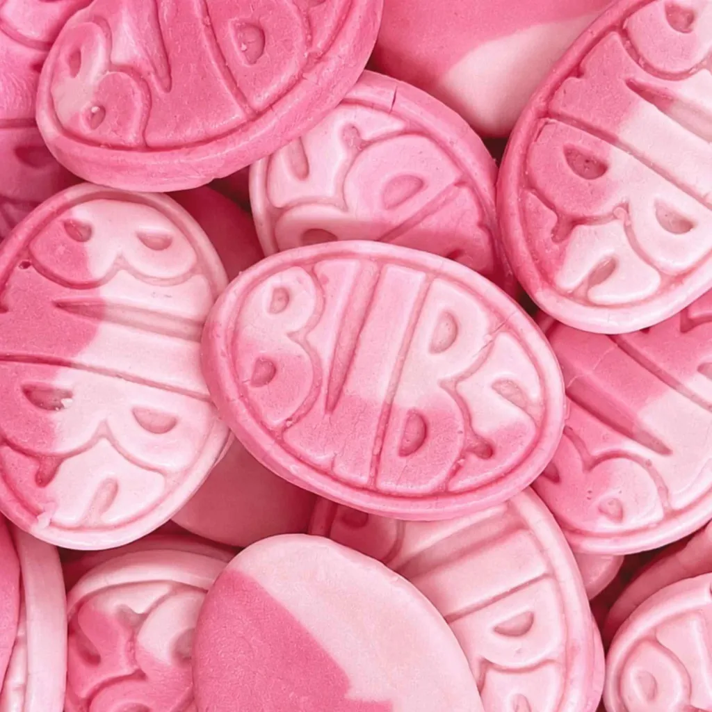 Pink and white BUBS foam candies, each embossed with the BUBS name